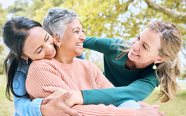 Image showing Retirement hug, seniors and bonding women in nature park, grass garden or relax environment in trust, community or security. Smile, happy and elderly friends in embrace for support or birthday pride