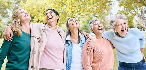 Image showing Senior people, laughing and bonding in comic joke or funny meme in nature park, spring garden or relax environment. Smile, happy women or diversity elderly friends with comedy in retirement support