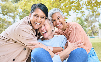 Image showing Retirement, women or laughing portrait in funny hug game, comic bonding or silly group activity in relax environment Smile, happy or elderly senior friends in nature park, grass garden or community