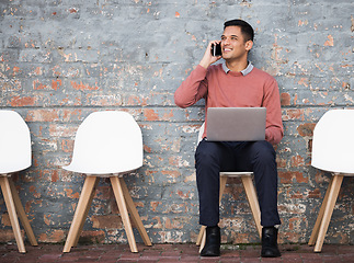 Image showing Phone call, recruitment and man on brick wall, sitting in line with hr news, job opportunity and hiring success. Smartphone, waiting room and person on technology for career networking and interview