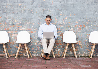 Image showing Laptop, startup man for recruitment in digital agency with tech waiting for business meeting, HR or hiring team. Business man, research or employee job interview for a cyber, programmer or hacker