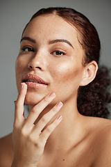 Image showing Face, sugar scrub and lips of woman in studio isolated on a gray background. Portrait, cosmetics and skincare of female model with lip dermatology product for exfoliation, cleaning and healthy skin.