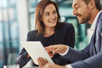 Image showing Training, coaching and business people with tablet in office workplace. Collaboration, mentor and woman and man pointing at touchscreen technology planning sales, financial or research and strategy.