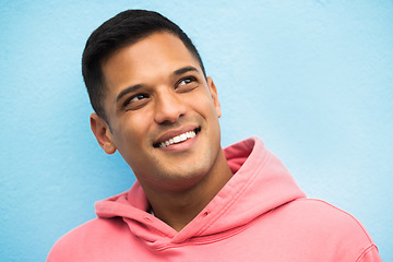 Image showing Smile, thinking and face of man on blue background with positive mindset, ideas and vision for future. Mockup, planning and isolated headshot of male with confidence, attitude and creative thoughts