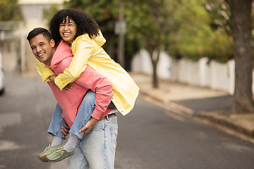 Image showing Black couple, piggyback and portrait of young people with love, care and bonding in a street. Urban, happy and black woman and man together with a smile and happiness loving summer fun outdoor