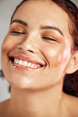 Image showing Skincare, natural beauty and face with a smile of happy person for dermatology, makeup and cosmetics. Facial, wellness and self care for freckles skin glow, teeth and a healthy model in studio