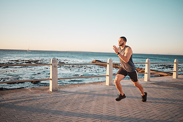 Image showing Running, sea and mockup with a man runner training outdoor on the promenade for cardio or endurance. Fitness, ocean and mock with a sports male taking a run on the coast for health or wellness