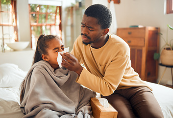 Image showing Sick, worried and girl blowing nose with father for healthcare, medical support and covid help. Virus, cold and frustrated African dad caring for a child with the flu, disease or illness in a house