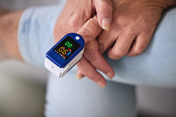 Image showing Pulse oximeter, healthcare and woman taking her heart rate in a retirement home during consultation. Medical, treatment and senior female patient measuring her oxygen blood levels with health device.