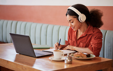 Image showing Cafe, girl or student writing in notebook planning or studying schedule for time management. College, school education or university learner working or learning via an an online course in coffee shop