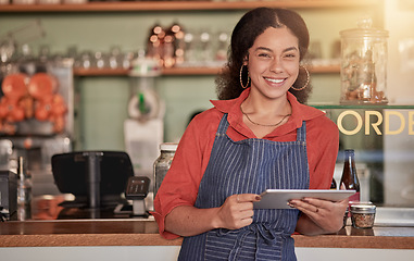 Image showing Portrait, restaurant waiter and woman with tablet to manage orders, inventory and stock check. Coffee shop barista, technology and happy female waitress holding digital touchscreen for managing sales