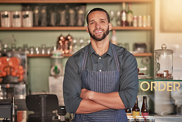 Image showing Portrait, cafe and barista man with arms crossed ready to take your order. Coffee shop, waiter and confident, happy and proud young male employee from Brazil or small business owner of cafeteria.