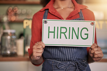 Image showing Small business, hands or business owner with a hiring sign for job vacancy offer at a cafe or coffee shop. Recruitment, marketing or female entrepreneur standing with an onborading message in store