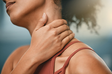 Image showing Fitness, injury and woman with neck pain from sports after gym accident, emergency and muscle trauma. Inflammation, sore and hand of an athlete with a painful body after training, exercise and cardio