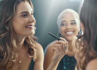 Image showing Makeup, smile and women getting ready for a party, social celebration and lipstick for an event. Happy, mirror reflection and friends with cosmetics for a girls night, new year and disco together