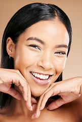 Image showing Beauty, makeup and portrait of a woman with foundation for skincare isolated on a studio background. Laughing, happiness and face of a cosmetics latino model smiling for glow on skin on a backdrop