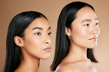 Image showing Face, skincare and diversity with model woman friends closeup in studio on a beige background. Beauty, facial or cosmetics with an attractive young female and friend posing to promote a skin product