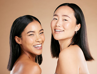Image showing Diverse, beauty and portrait of women with makeup isolated on a studio background. Smile, dermatology and face of model friends with happiness for foundation shade diversity on a beige backdrop