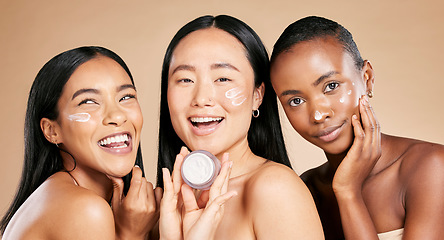 Image showing Beauty, face cream and portrait of friends in studio for wellness, grooming and hygiene on brown background. Women, skincare and lotion for girl group with different, facial and product or isolated