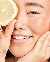 Image showing Skincare, glow and portrait of a healthy woman with a lemon for body detox, health and wellness. Vitamin c, food and happy Japanese model with a fruit for diet, nutrition and vegan dermatology