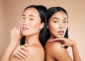 Image showing Skincare, portrait and makeup for women in studio for wellness, hygiene and grooming on brown background. Face, friends and eyeshadow on girl with different, skin and beauty, relax and isolated