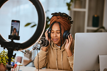 Image showing Communication, phone and influencer streaming podcast, radio talk show or speaker talking about teen culture. Presenter, black woman or host speaking about student news on online broadcast microphone