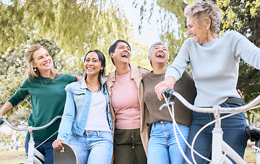 Image showing Happy senior woman, friends and laughing in joyful happiness enjoying fun time together at the park. Group of elderly women bonding and sharing joke, laugh or walking and cycling in the outdoors