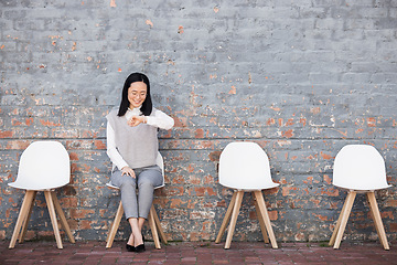 Image showing Business, Asian woman and check time for job interview, waiting and smile in line on chair. Female employee, confident lady and interviewee for work opportunity, hiring and schedule with appointment
