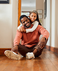 Image showing Portrait, hug and family by father and daughter in their home, relax and smile while bonding indoors. Black man, embrace and girl with parent on a floor, cheerful and content in their house