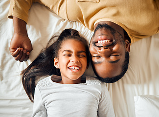 Image showing Family, love and black man with girl or child lying in bed in a home smiling and bonding by having fun. Top, dad and daughter in a house with her father, face and happiness in a bedroom feeling happy