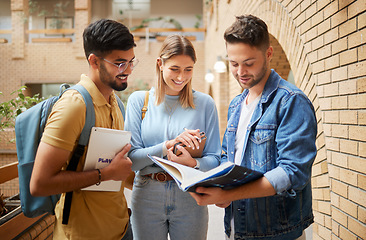 Image showing University, students and friends reading study book for project, education or sharing information together at campus. Group of college people with textbook for learning, knowledge or scholarship