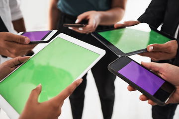 Image showing Hands, green screen and mockup with a business team in studio isolated on a white background for communication or networking. Tablet, phone and technology with an employee group on blank space