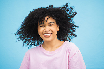 Image showing Shake hair, face portrait and black woman with healthy shampoo hairstyle, studio beauty or luxury facial skincare. Cosmetic makeup, spa salon or afro girl from Brazil isolated on blue background wall