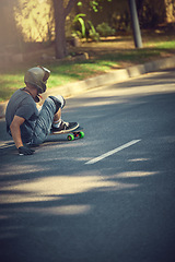 Image showing Skateboard, street and mockup with a sports man skating or training outdoor while moving at speed for action. Fitness, exercise and road with a male skater or athlete outside to practice his balance