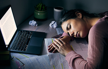 Image showing Woman, laptop and student sleeping, night and burnout for studying, mental health and overworked. Female, girl or academic tired for test, report or lady with computer, late evening or notes for exam