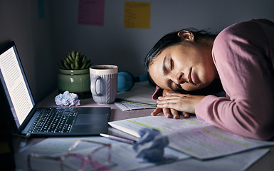 Image showing Sleeping, tired and fatigue student at night for study, learning and university depression, mental health or burnout on laptop. Depressed, stress and college woman with exam notebook on desk in dark