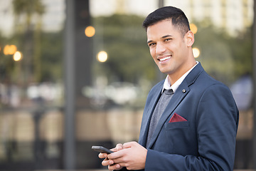 Image showing Cellphone, portrait and businessman outdoor in the city with success, leadership and confidence. Technology, mobile and happy professional corporate manager networking on a cellphone in the town.