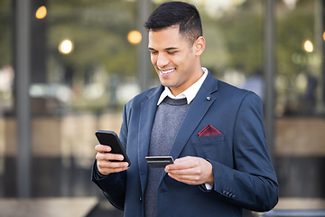 Image showing Phone, online shopping or business man with credit card for payment, internet purchase or ecommerce in London street. Fintech, happy or employee for trading, banking or investment with smile in city