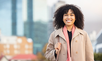 Image showing Business woman, portrait and smily of a young professional happy with a smile by urban building. Worker, smiling and happiness of a female by buildings excited about work success with mock up space