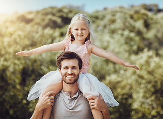 Image showing Portrait, father carry girl and outdoor with smile, love and bonding on weekend, happiness and loving together. Dad, daughter on back or embrace in nature, playing and fun on holiday and quality time