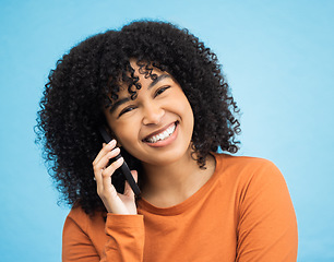 Image showing Afro portrait, black woman or phone call by isolated blue background in funny gossip, comedy news or comic story. Smile, face or happy person talking on mobile communication technology by wall mockup