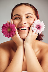 Image showing Woman, flowers and studio headshot with smile for beauty, wellness or skincare with spring aesthetic by backdrop. Model, girl and carnation plant for cosmetic health, skin glow and happy for growth