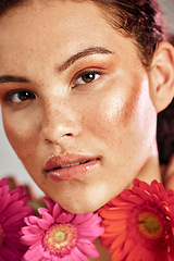 Image showing Beauty portrait, woman and flowers for skincare dermatology, makeup and cosmetics. Facial, wellness and self care for skin glow, daisy product and face freckles of a healthy model for floral headshot