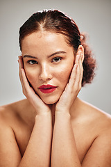 Image showing Makeup, beauty woman and portrait with face in hands in studio for cosmetics and skin dermatology. Headshot of aesthetic person with red lipstick color for strong and confident facial skincare idea