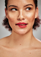 Image showing Beauty, face and woman with lipstick, thinking with makeup and flirt, sexy with skin and cosmetics isolated on studio background. Skincare, bite lips and red with spa treatment and cosmetic care