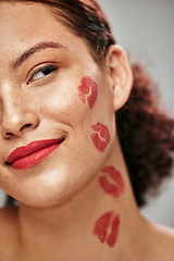 Image showing Makeup, lipstick kiss and beauty of woman model in studio for cosmetics, love and glow on skin. Headshot of aesthetic person with red color lips for valentines day facial idea or skincare motivation