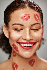 Image showing Happy woman, lipstick kiss and red color makeup on face of model in studio for cosmetics. Headshot of aesthetic person thinking about love for valentines day spa facial idea or skincare motivation