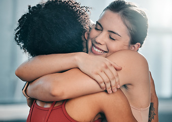 Image showing Fitness, women or friends hug at gym for support after workout, sports exercise or training. Happy girls, embrace or healthy sports people smile while hugging after exercising together for motivation