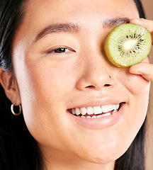 Image showing Asian woman, smile and kiwi skincare portrait for facial skincare wellness, luxury organic product and happy dermatology. Model, face and fruits vitamins for natural cosmetics happiness or skin glow