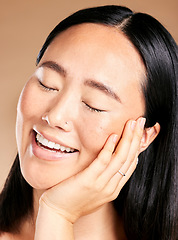 Image showing Beauty, skincare or woman with a happy smile on her face in grooming routine isolated on studio background. Tokyo, relaxed or beautiful Japanese girl model in luxury facial treatment for self care